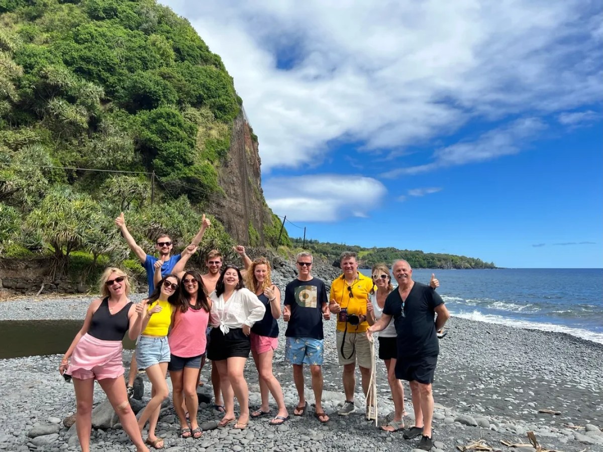 A group of people at the beach in Maui