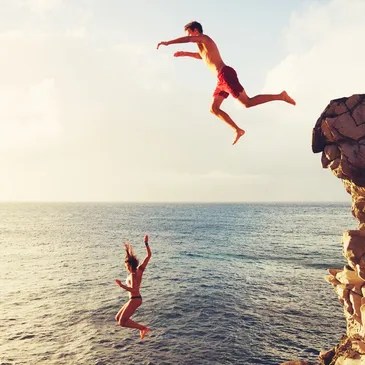rs=w_365,h_365,cg_true,m 2 people cliff jumping in Maui, Hawaii