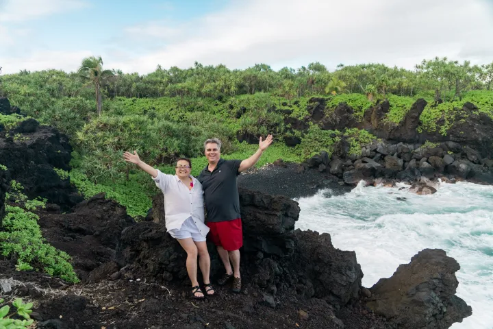 a person standing on a rock