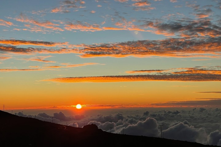 a sunset over a body of water
